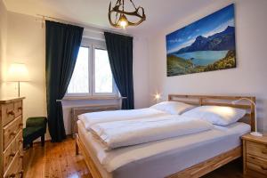 Ένα ή περισσότερα κρεβάτια σε δωμάτιο στο Appartements Das Charlie