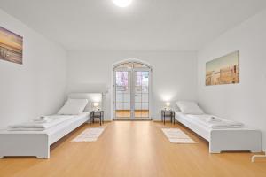 Posezení v ubytování home2stay Apartmenthaus Deggendorf Wifi Smart TV Parking***
