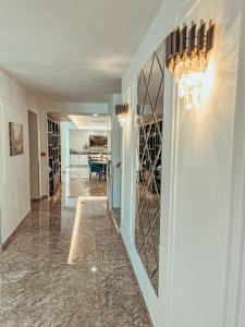 a hallway of a home with a wine cellar at Hotel Neon in Timişoara