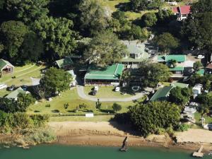an aerial view of a house with a lake at Port St Johns River Lodge in Port St Johns