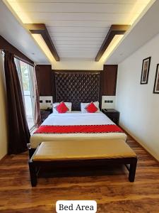 Letto o letti in una camera di Divan Clarks Inn Goa