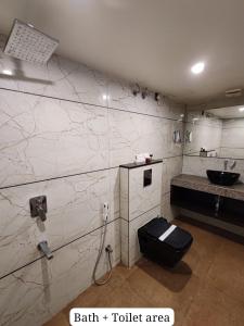 Bagno di Divan Clarks Inn Goa