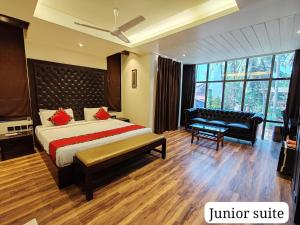 Letto o letti in una camera di Divan Clarks Inn Goa