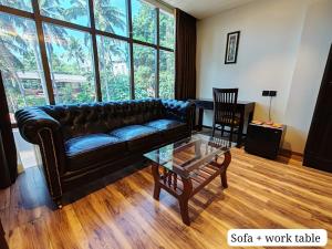 Area soggiorno di Divan Clarks Inn Goa