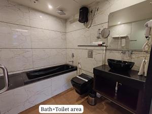 Bagno di Divan Clarks Inn Goa