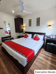Letto o letti in una camera di Divan Clarks Inn Goa
