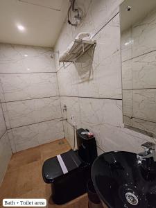 Bagno di Divan Clarks Inn Goa