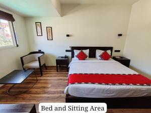 Letto o letti in una camera di Divan Clarks Inn Goa