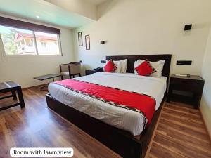 Letto o letti in una camera di Divan Clarks Inn Goa