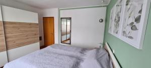Postel nebo postele na pokoji v ubytování Haus Tildchen