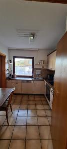 Kuchyň nebo kuchyňský kout v ubytování Haus Tildchen