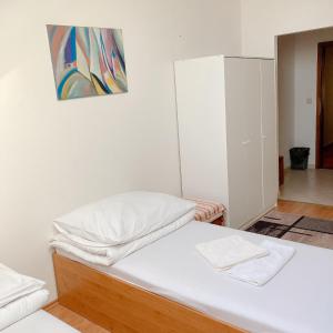 Postel nebo postele na pokoji v ubytování Hotel Nostalgia