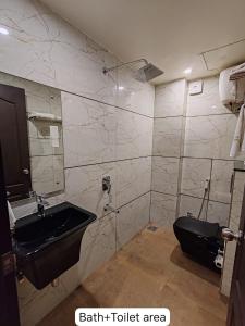 Bagno di Divan Clarks Inn Goa