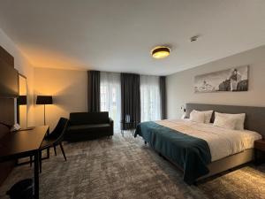 Кровать или кровати в номере Focus Hotel Premium Lublin