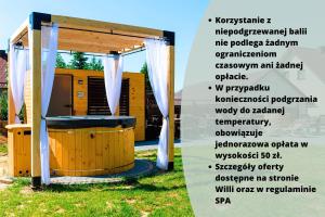 une affiche décrivant les avantages d'un kiosque dans l'établissement Willa ŻeglarSki, à Kluszkowce