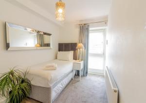GuestReady - Impressionante Flat com Vista Terraço客房内的一张或多张床位
