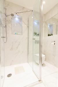 Phòng tắm tại GuestReady - Impressionante 2BR Flat com Vista Terraço e Mar