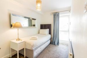 GuestReady - Impressionante Flat com Vista Terraço客房内的一张或多张床位
