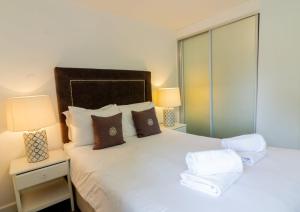 GuestReady - Impressionante Flat com Vista Terraço客房内的一张或多张床位