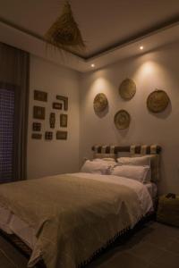 Кровать или кровати в номере Villa ô