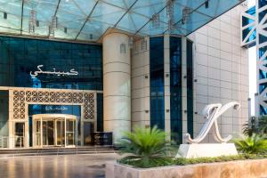 a large building with a glass ceiling at Kempinski Residences & Suites, Doha in Doha