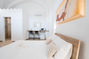 Giường trong phòng chung tại La Pigna