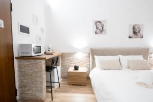 Giường trong phòng chung tại La Pigna