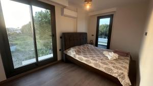 Katil atau katil-katil dalam bilik di S Villa City +8 gambar