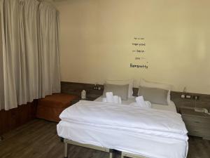 Giường trong phòng chung tại Hotel Lido