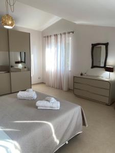 Postel nebo postele na pokoji v ubytování B&B La Terrazza