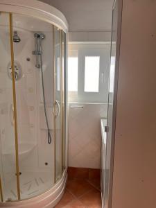 a shower with a glass enclosure in a bathroom at Villa Portitxol en Moraira in Moraira