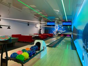 a bowling alley with balls on the lanes at Rewita Solina in Solina