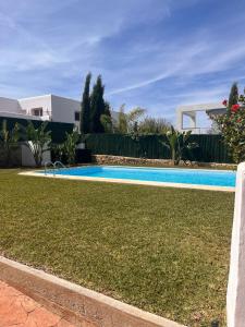 Bazén v ubytování Villa Portitxol en Moraira nebo v jeho okolí