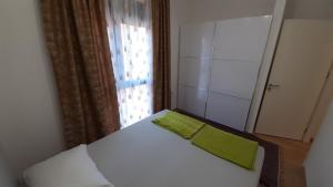Postel nebo postele na pokoji v ubytování Violeta 1