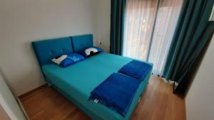 Postel nebo postele na pokoji v ubytování Violeta 1