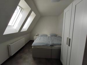Postel nebo postele na pokoji v ubytování Ubytování Slezská Harta