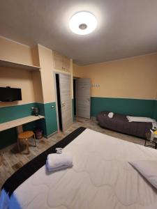 A bed or beds in a room at Le terrazze di Alberto
