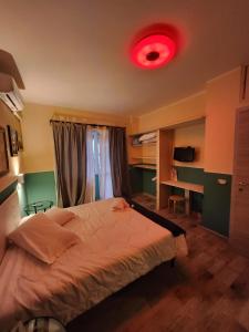 A bed or beds in a room at Le terrazze di Alberto
