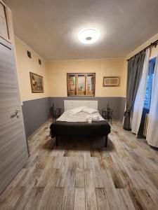A bed or beds in a room at Le terrazze di Alberto