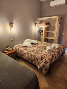 A bed or beds in a room at Le terrazze di Alberto