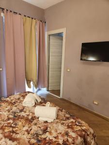 A bed or beds in a room at Le terrazze di Alberto