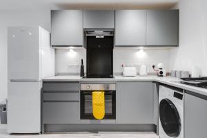 Virtuve vai virtuves zona naktsmītnē GuestReady - A contemporary city nest in Vauxhall