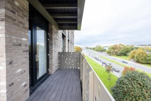 a balcony with a view of a street at GuestReady - A family retreat in Vauxhall in Liverpool