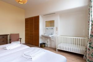 Ένα ή περισσότερα κρεβάτια σε δωμάτιο στο NEW Hello Zeeland - Vakantiehuis Markt 10