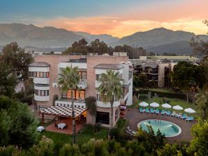 an aerial view of a resort with a swimming pool at Limak Limra Hotel & Resort Kemer - Kids Concept in Kemer