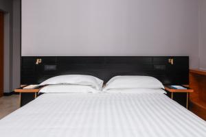 Voodi või voodid majutusasutuse Hotel Valerì toas
