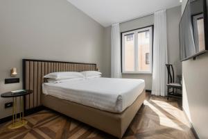 Voodi või voodid majutusasutuse Hotel Valerì toas