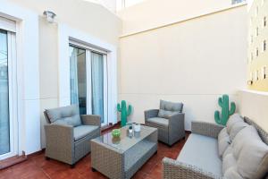 Posezení v ubytování Penthouse Cactus Old Center