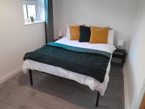 Posteľ alebo postele v izbe v ubytovaní Pickwood Lodge East - Charming Eco Home