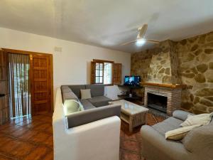 A television and/or entertainment centre at Villa La Solana Rocabella
